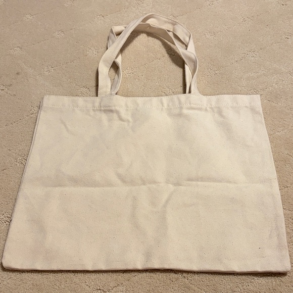 Macy's Cream Canvas Tote with Red Star - Picture 2 of 2